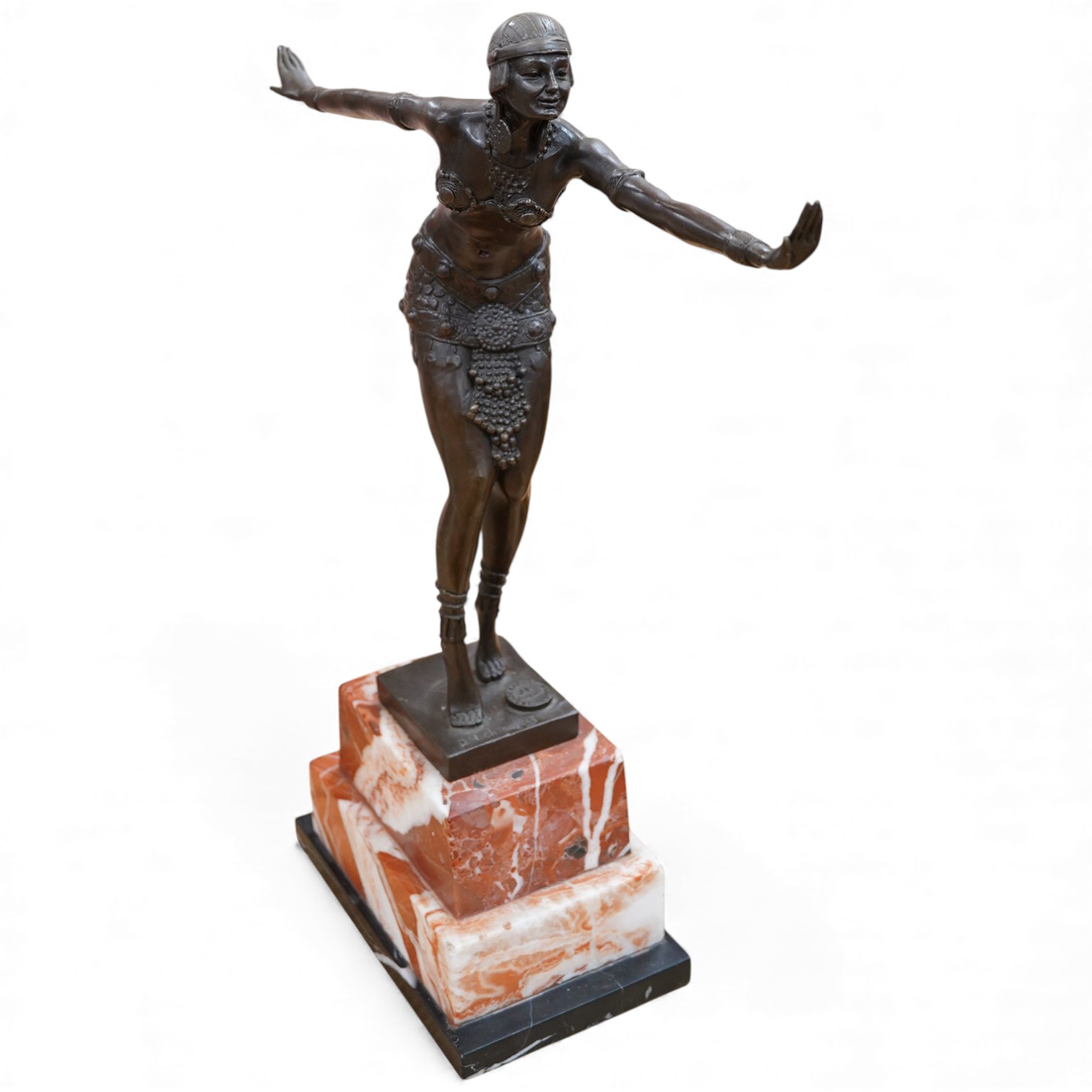 After Demétre Haralamb Chiparus (1886–1947), an Art Deco style bronze of a dancing lady, raised on stepped marble base, 48cm high